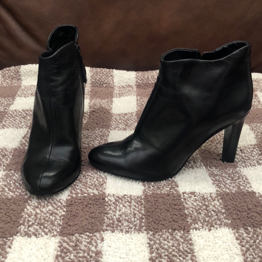 Black leather ankle bootie.